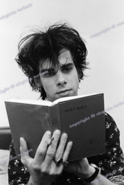 Nick Cave with bible. The Birthday Party In Leeds